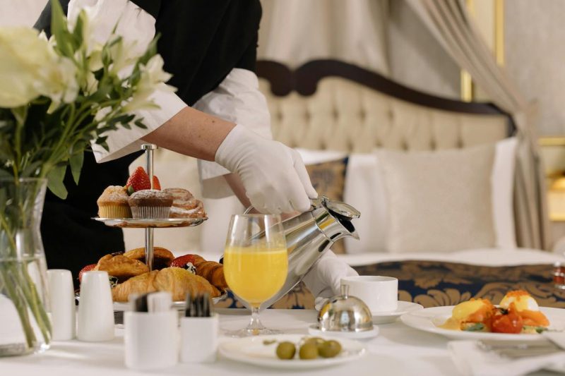 maid provide guest services in a branded residence