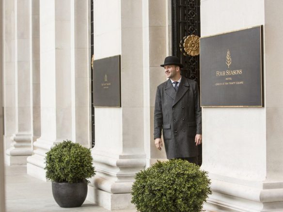 Doorman providing world class service and welcome at a Four Seasons Private Residences and hotels