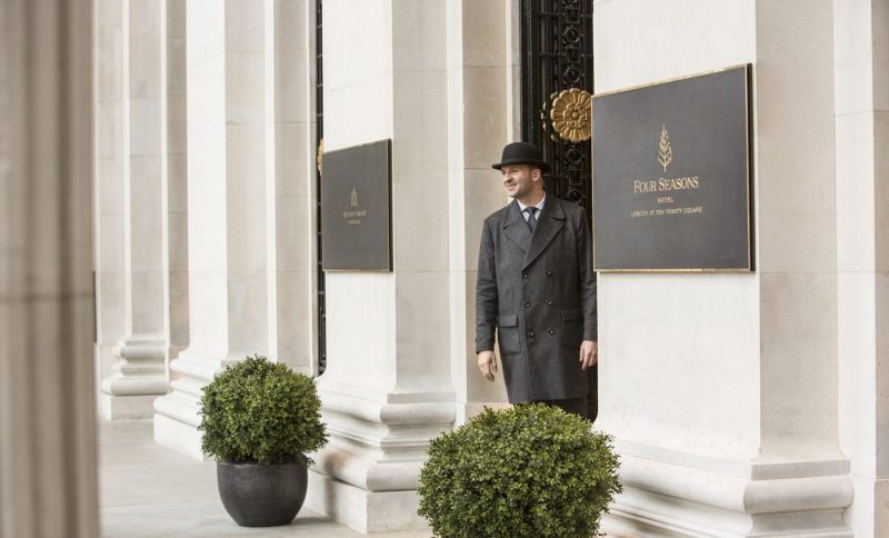 Doorman providing world class service and welcome at a Four Seasons Private Residences and hotels