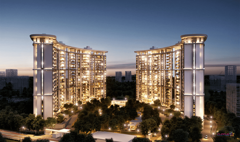 A luxury branded residence in India at night, one of the many branded real estate projects in the country