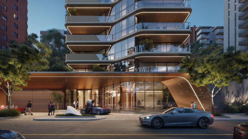 exterior and entrance of a Pininfarina Residence with luxury cars at the drop off area