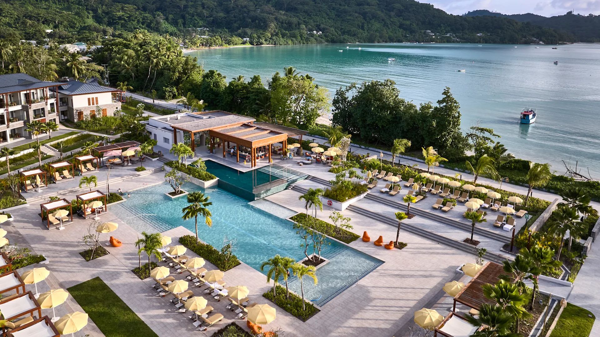 canopy residences view of the swimming pool and beach at Canopy Residences Seychelles