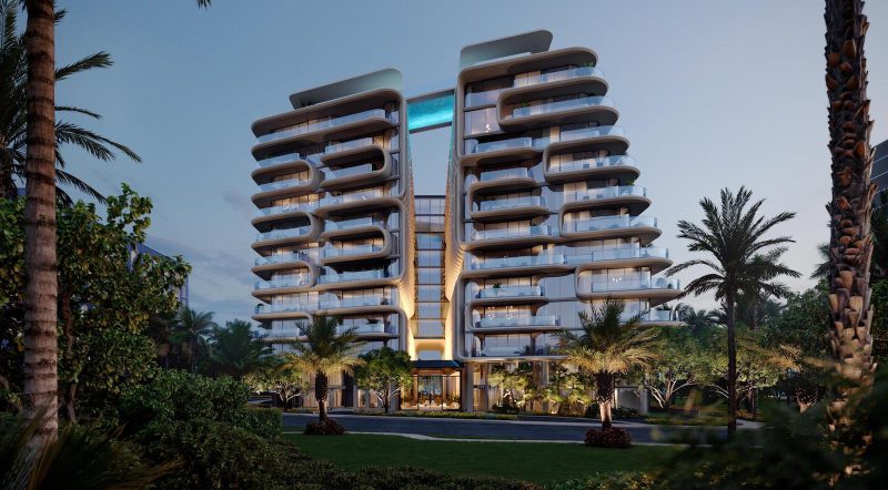 External rendering at dusk of The Delmore Condominium Miami
