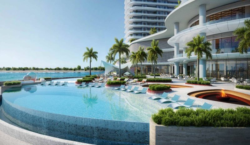 Swimming pool and outdoor communal areas of Trio Isle Interiors by Missoni luxury branded residences in Ras Al Khaimah