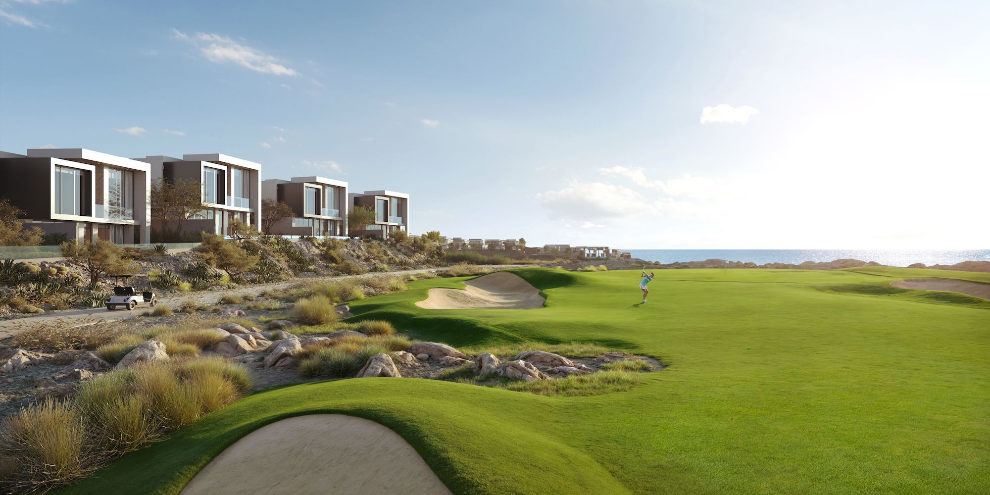 Trump Golf Villas positioned along the Trump International Championship Golf Course, with open golf and sea views.